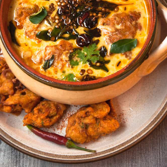 Kari Pakora – Tangy Yogurt Curry with Crispy Fritters